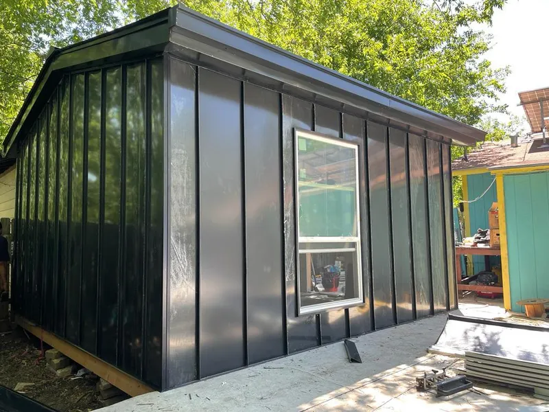 Black standing seam metal wall panels for Metal Roof Installation in Pinecrest