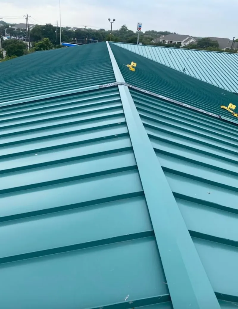 Green commercial metal roof ridge and valley for Metal Roof Repair in Pinecrest